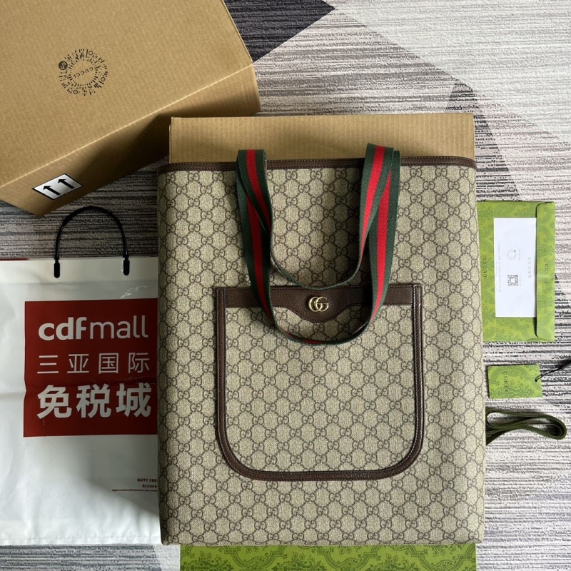 G*u*i shopping bags